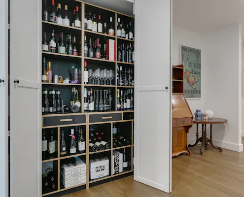 Wine cellar in Encounter Bay with bi-fold doors Wine cellar storage behind bi folding doors