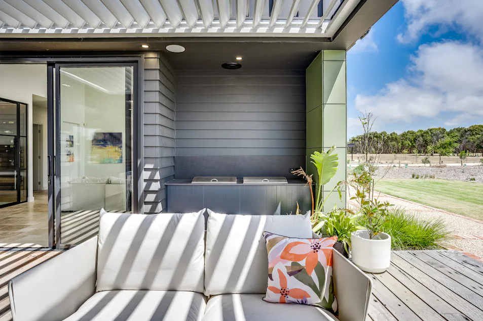 Outdoor kitchen with double teppanyaki plates and seating area in Port Elliot